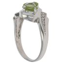 9ct White Gold Peridot and 0.06ct Diamond Three Stone Ring