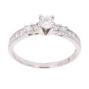 18ct White Gold Brilliant And Baguette Cut Solitaire Ring
