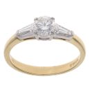 18ct Yellow Gold 0.65ct Brilliant And Baguette Cut Diamond Solitaire Ring