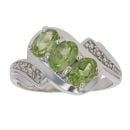9ct White Gold Peridot and 0.06ct Diamond Three Stone Ring