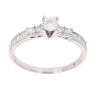 18ct White Gold Brilliant And Baguette Cut Solitaire Ring